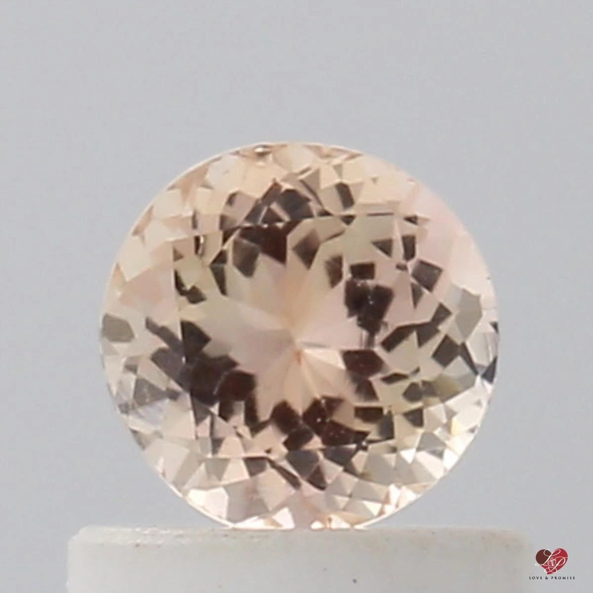 0.67cts Round Peachy Blush Champagne Sapphire