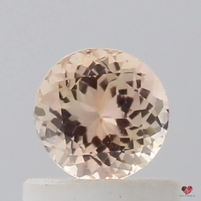 0.67cts Round Peachy Blush Champagne Sapphire