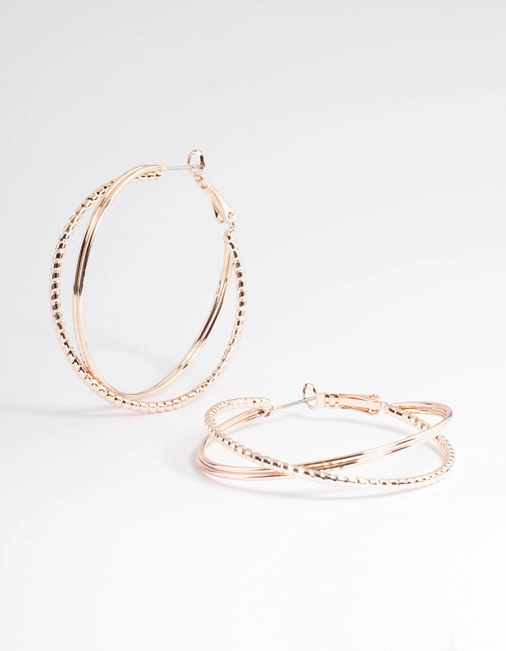 Rose Gold Textured Cross Over Hoop Earrings