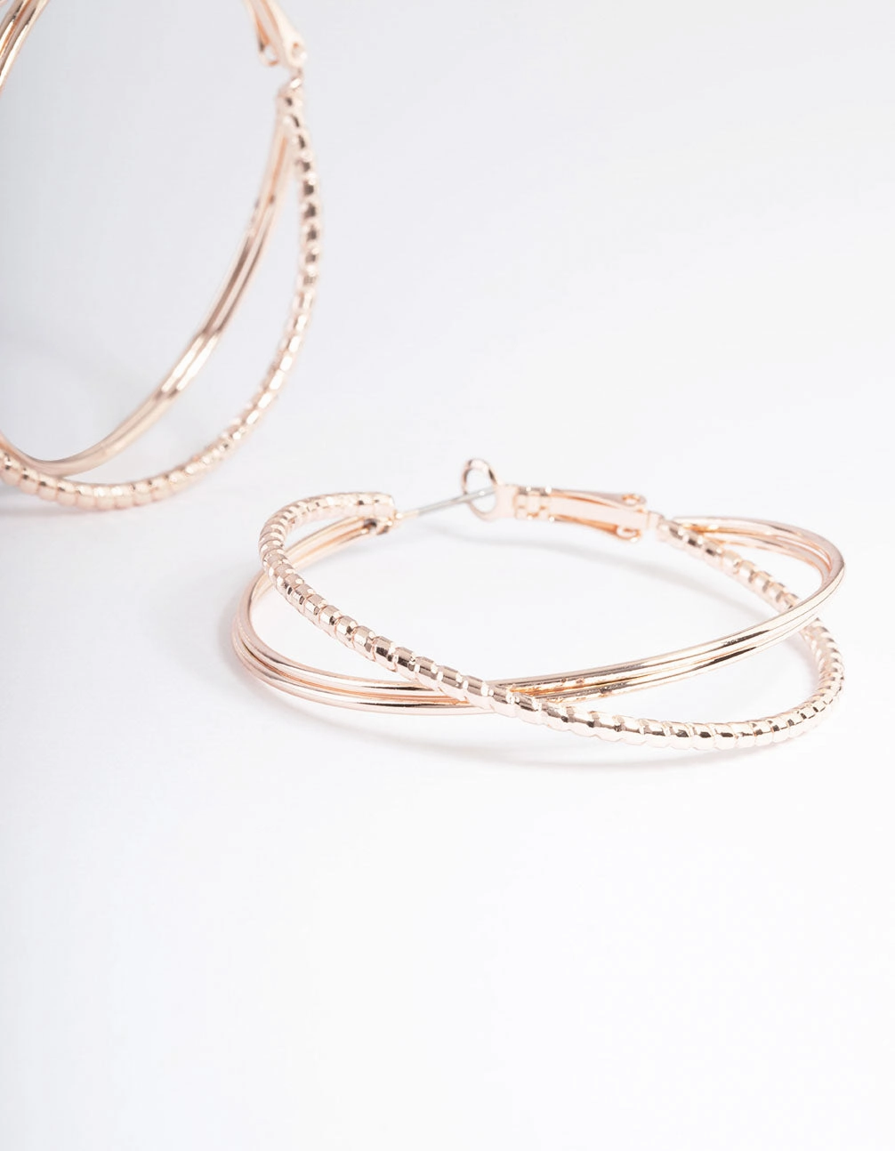 Rose Gold Textured Cross Over Hoop Earrings