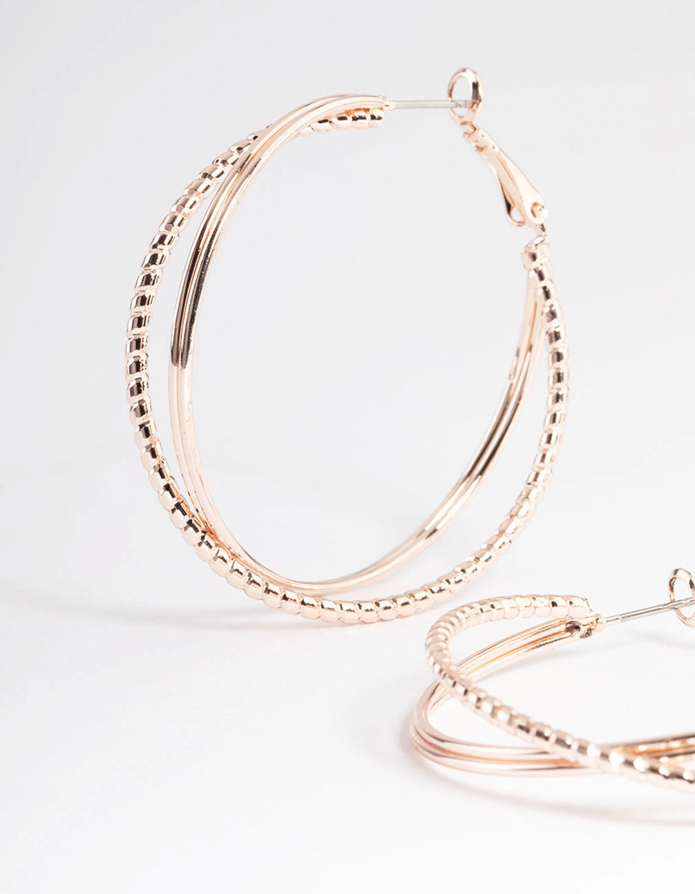 Rose Gold Textured Cross Over Hoop Earrings